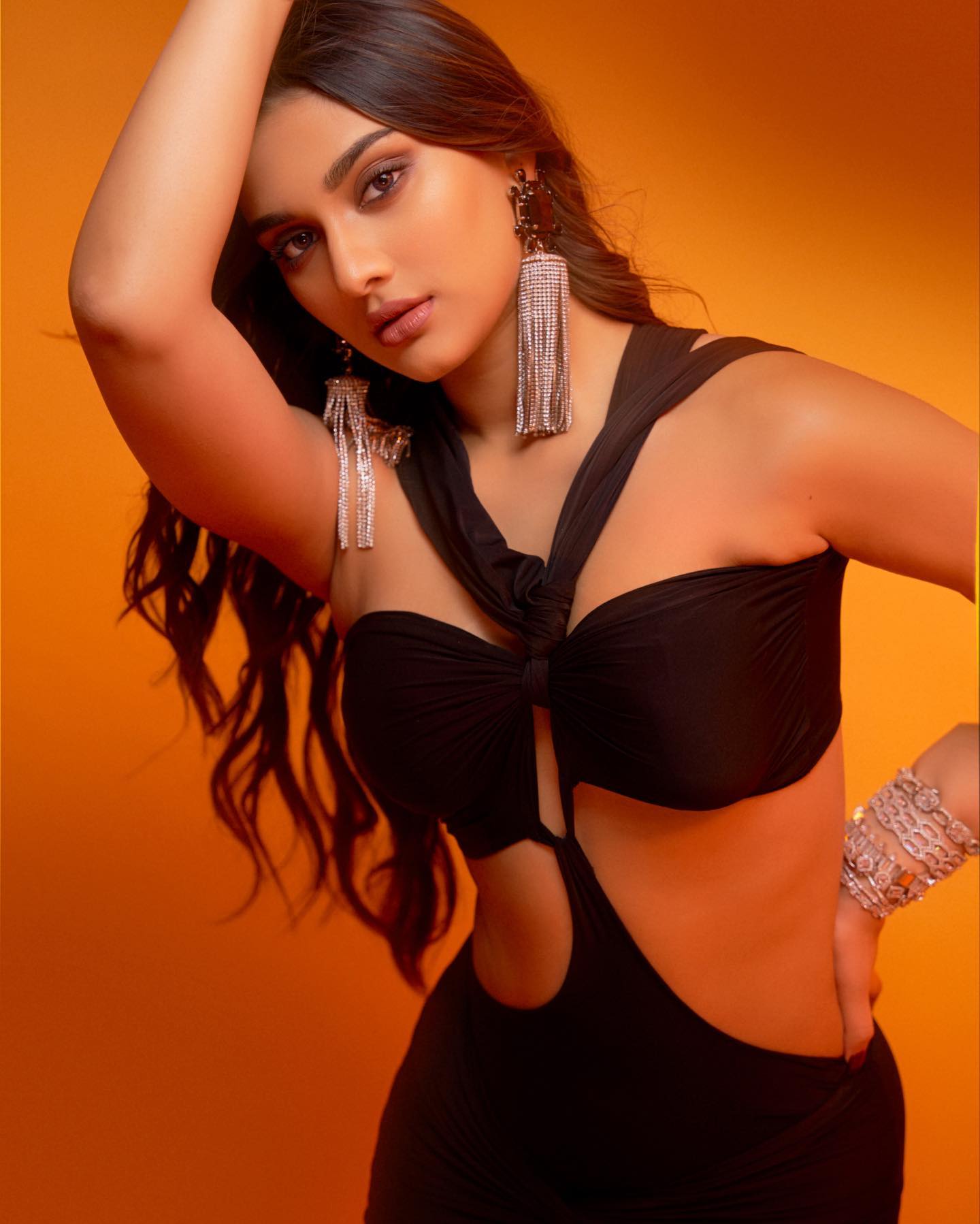 Saiee M Manjrekar’s black halter neck dress had nice details and a high slit.