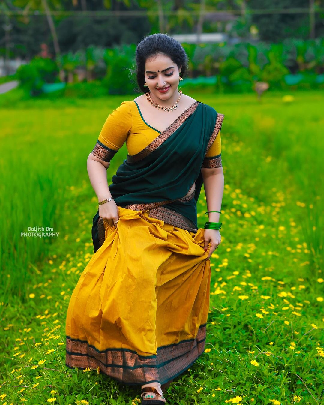 Malavika wore a traditional davani (half saree) in vibrant colors