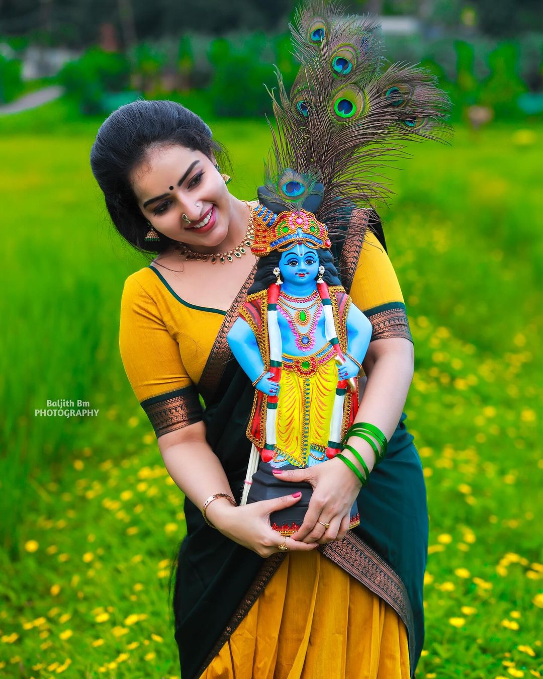 Malavika wore a traditional davani (half saree) in vibrant colors