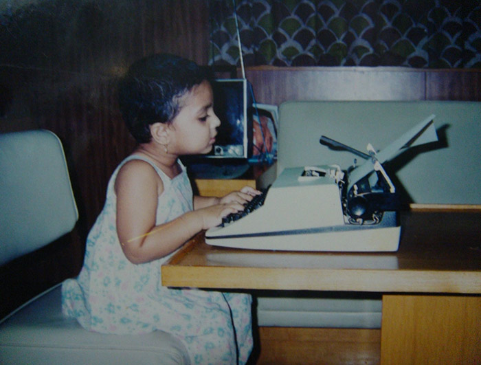 Even as a child, she seemed comfortable in front of the camera, posing happily.