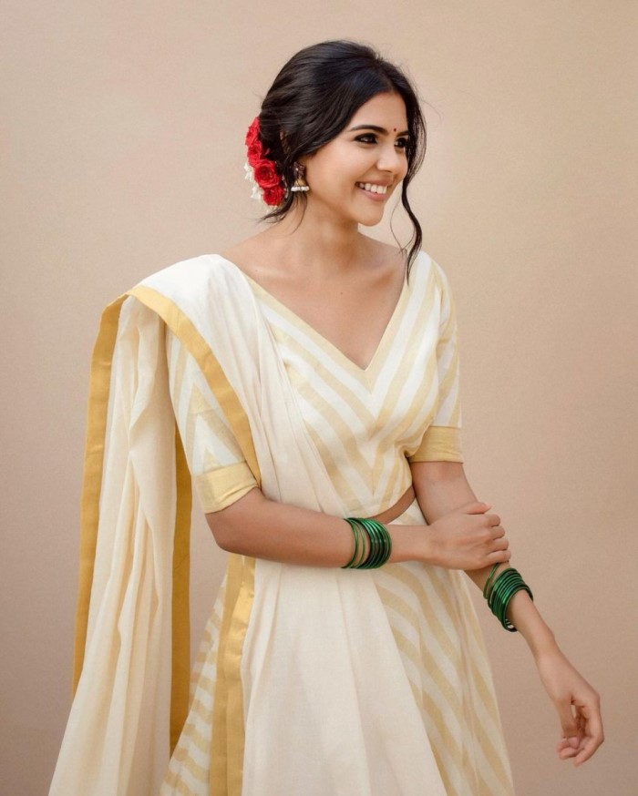 Kalyani Priyadarshan adds a touch of contemporary style with her kasavu skirt and top paired with a dupatta