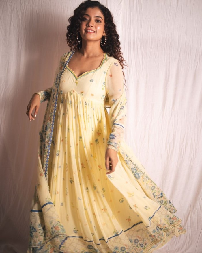 If you're looking for something different from Kasavu this Onam, consider Anna Ben's floral anarkali salwar which exudes grace and elegance while maintaining both festive and casual vibes.