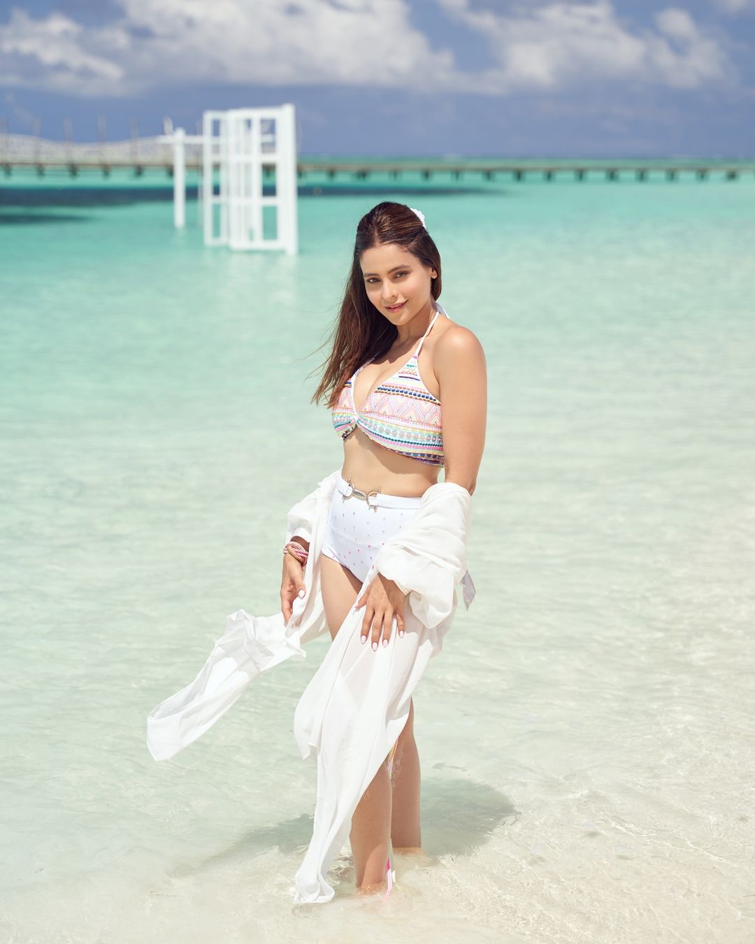 Aamna Sharif Dazzles Fans With Stunning Beach Vacation In tranquil beach.