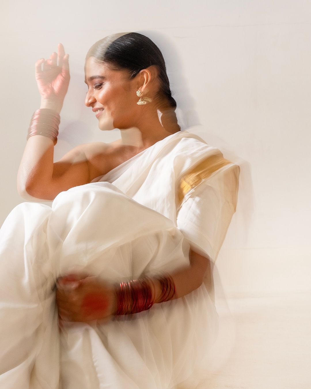 Chaithra J Achar looks stunning in a traditional white Kerala saree