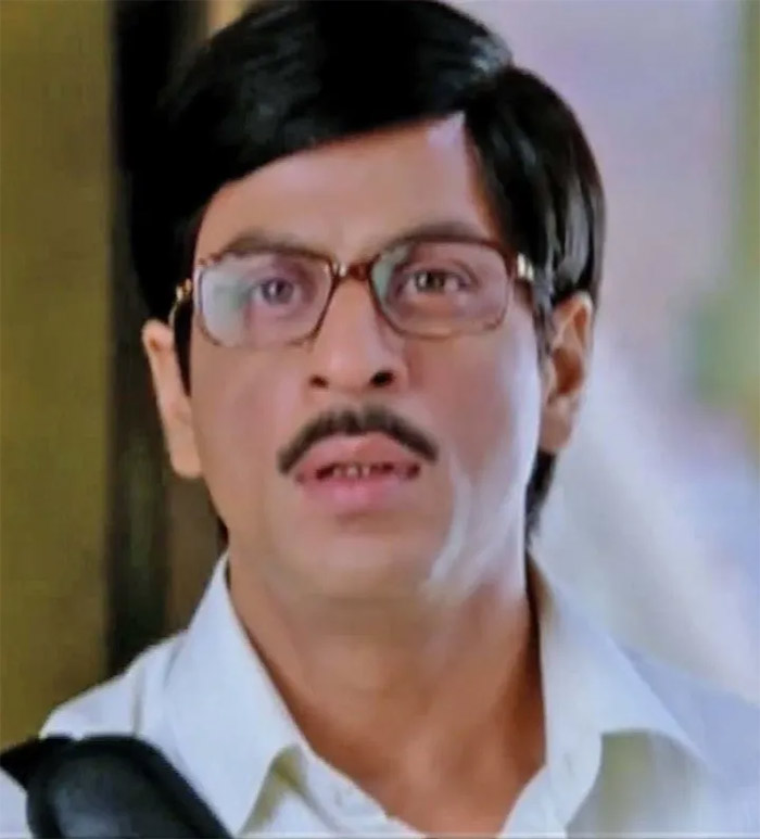 The Side Part: A classic hairstyle that never goes out of fashion, Shah Rukh Khan's side part is both elegant and timeless.