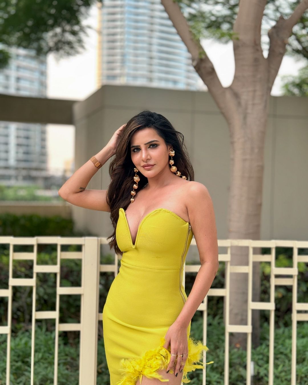 Ashu Reddy's Bold and Glamorous Fashion: Iconic Yellow Gown and Trendy Looks