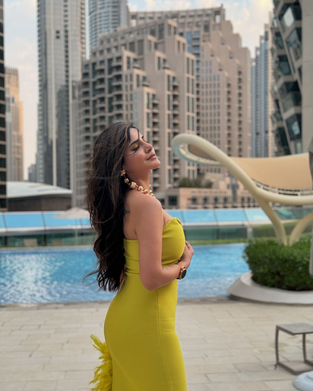 Ashu Reddy's Bold and Glamorous Fashion: Iconic Yellow Gown and Trendy Looks