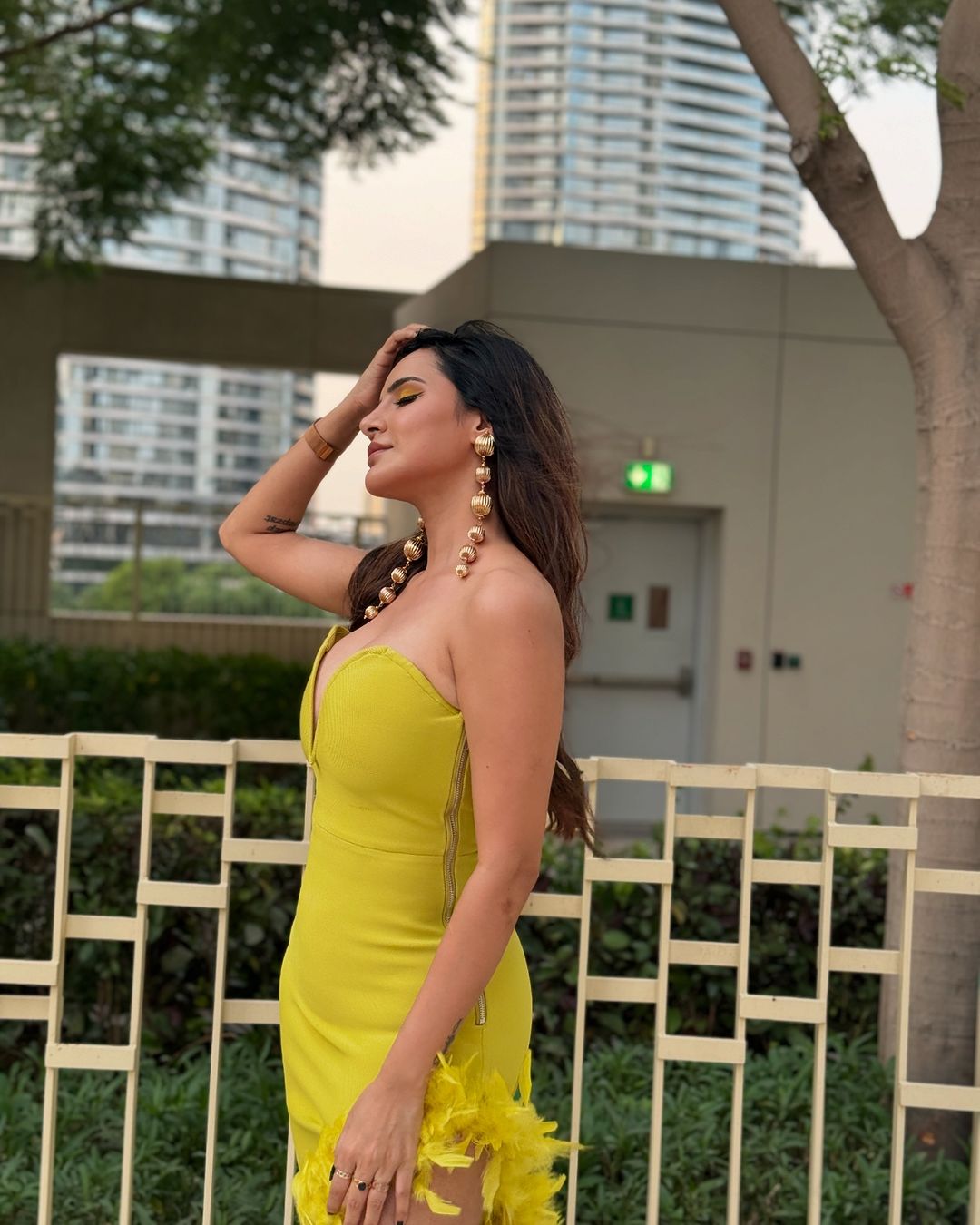 Ashu Reddy's Bold and Glamorous Fashion: Iconic Yellow Gown and Trendy Looks