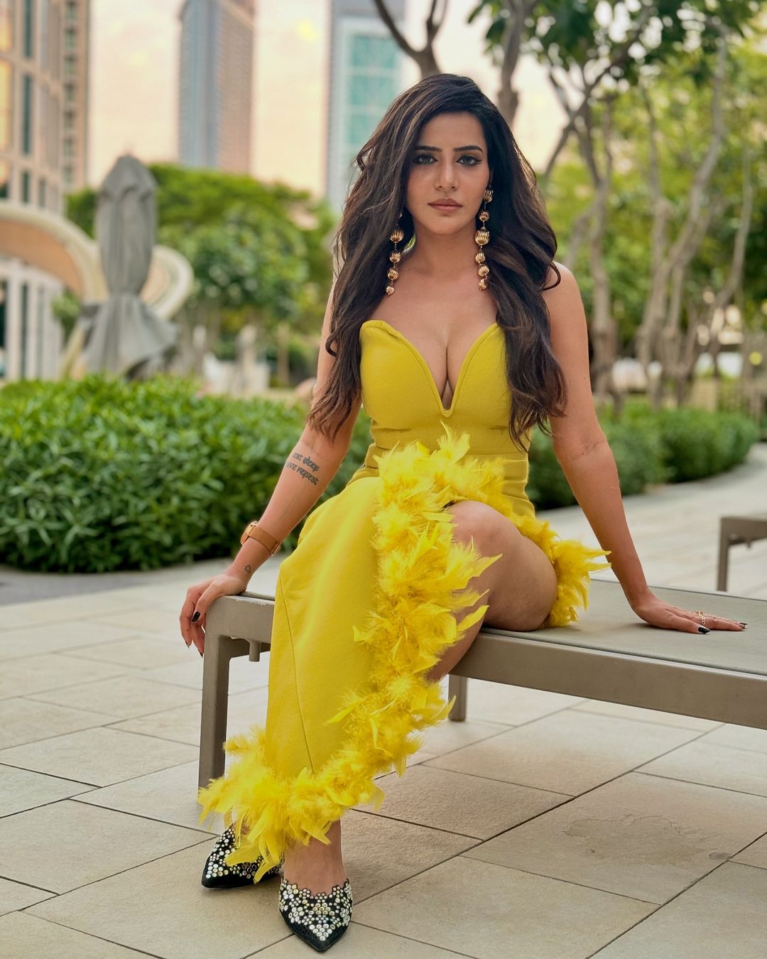Ashu Reddy's Bold and Glamorous Fashion: Iconic Yellow Gown and Trendy Looks