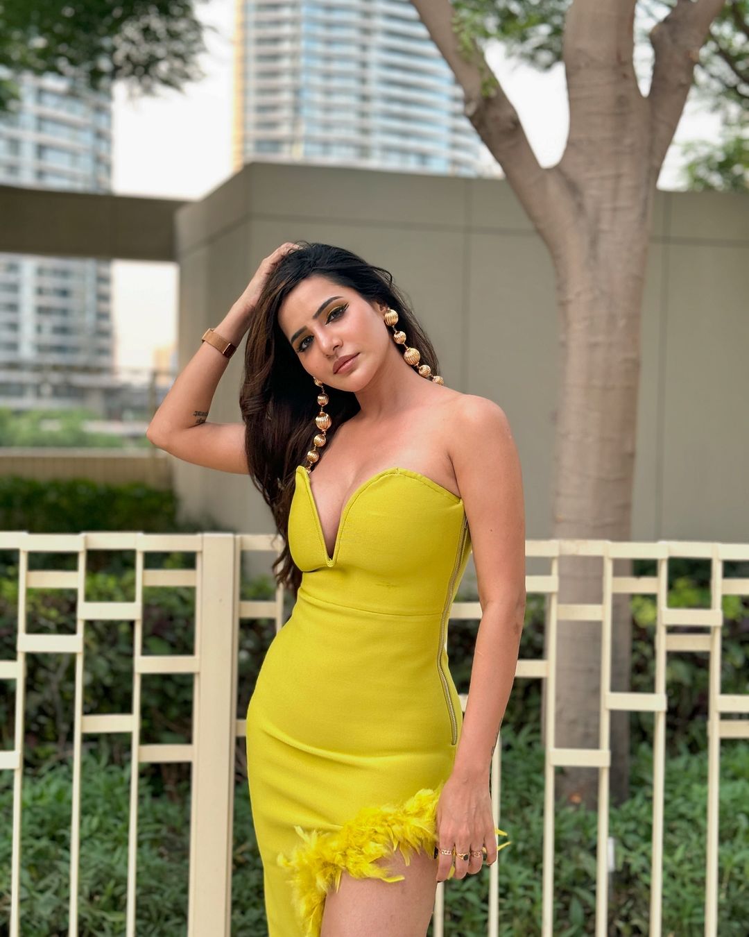 Ashu Reddy's Bold and Glamorous Fashion: Iconic Yellow Gown and Trendy Looks