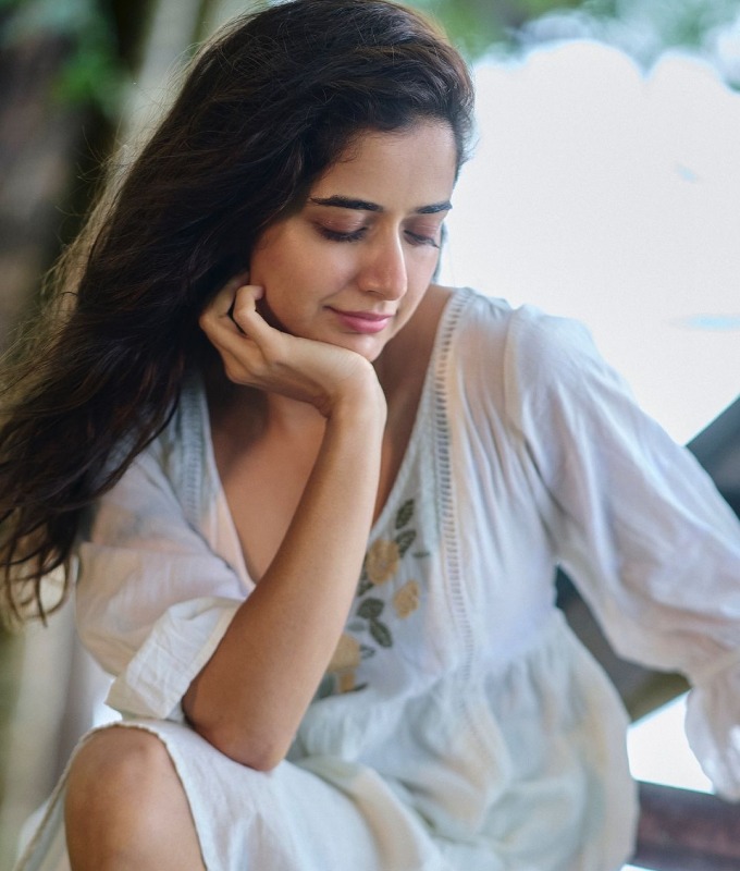 Kannada actress Ashika Ranganath is enjoying the rainy weather