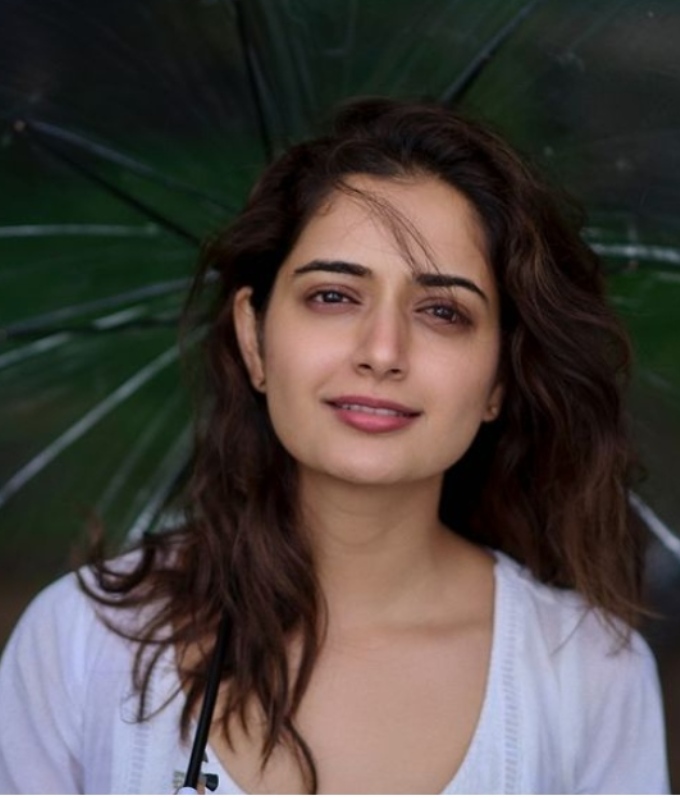 Kannada actress Ashika Ranganath is enjoying the rainy weather