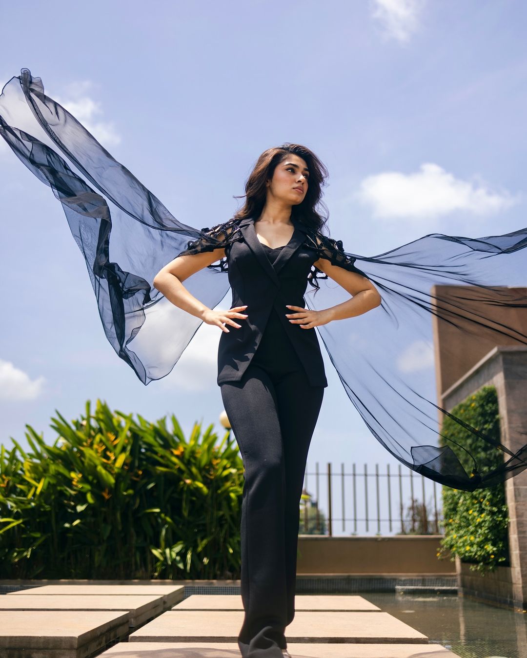 Krithi Shetty in all-black jumpsuit with cape sleeves makes a bold fashion statement