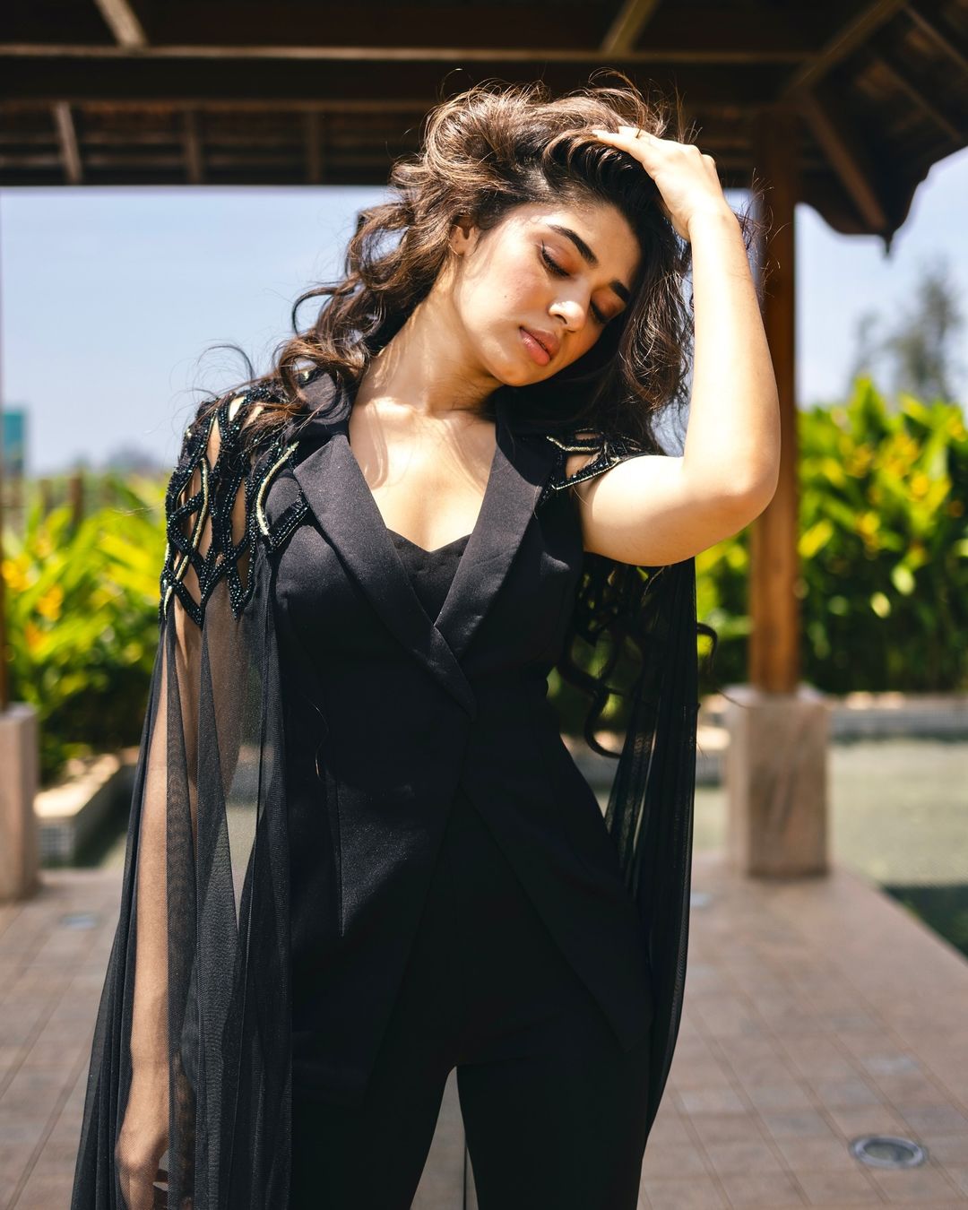 Krithi Shetty in all-black jumpsuit with cape sleeves makes a bold fashion statement