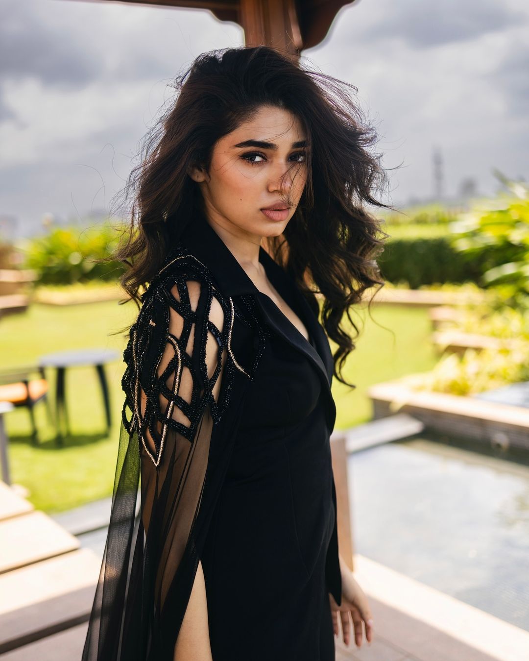 Krithi Shetty in all-black jumpsuit with cape sleeves makes a bold fashion statement