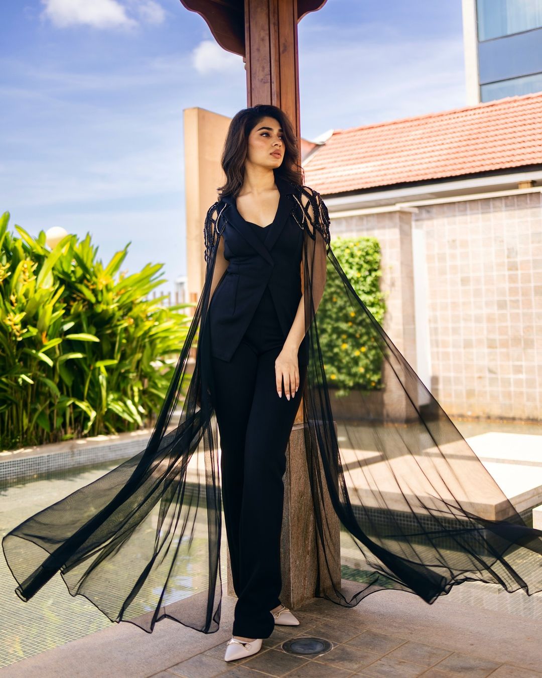 Krithi Shetty in all-black jumpsuit with cape sleeves makes a bold fashion statement
