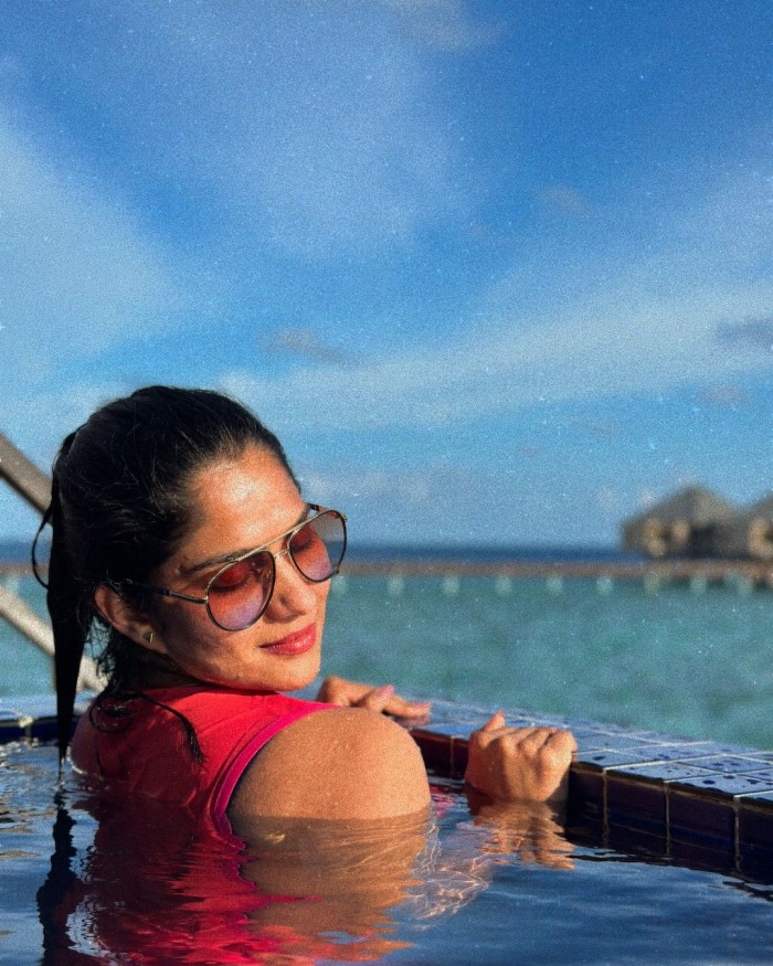 Swasika finds solace in the calming atmosphere of the beach, taking a break from her busy schedule to unwind and rejuvenate.