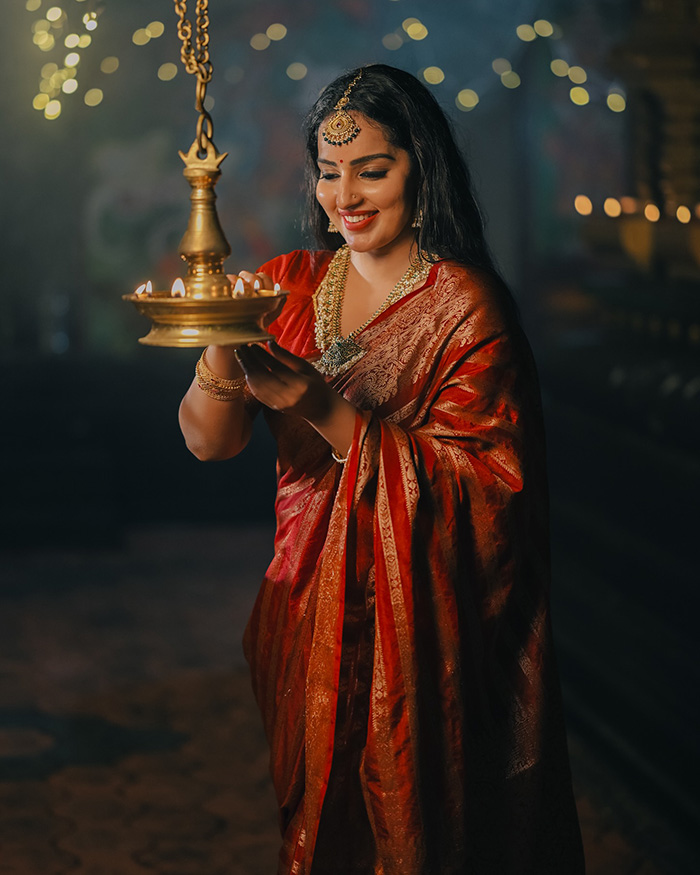 The highlight of the celebration was Malavika lighting diyas, symbolizing the triumph of light over darkness and spreading warmth and positivity during the festival.