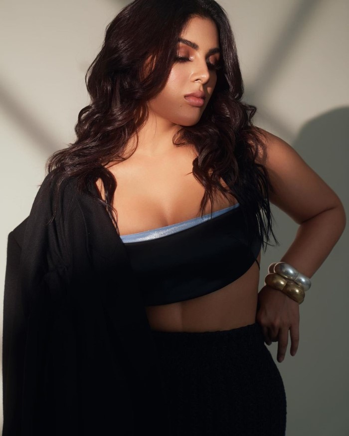 Samyuktha adds a polished finish to her outfits by draping jackets or blazers, giving a touch of formality and chicness.