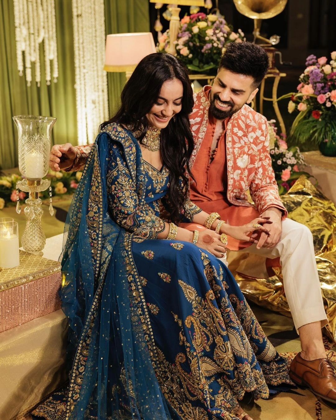 Sumit Suri wore a contrasting terracotta kurta, white trousers, and an embroidered jacket designed by Rachit Khanna.