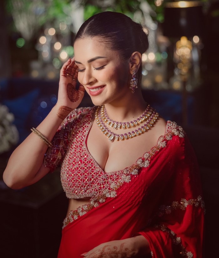 Her makeup was kept subtle yet elegant, with a classic updo hairstyle that completed her overall stunning look.