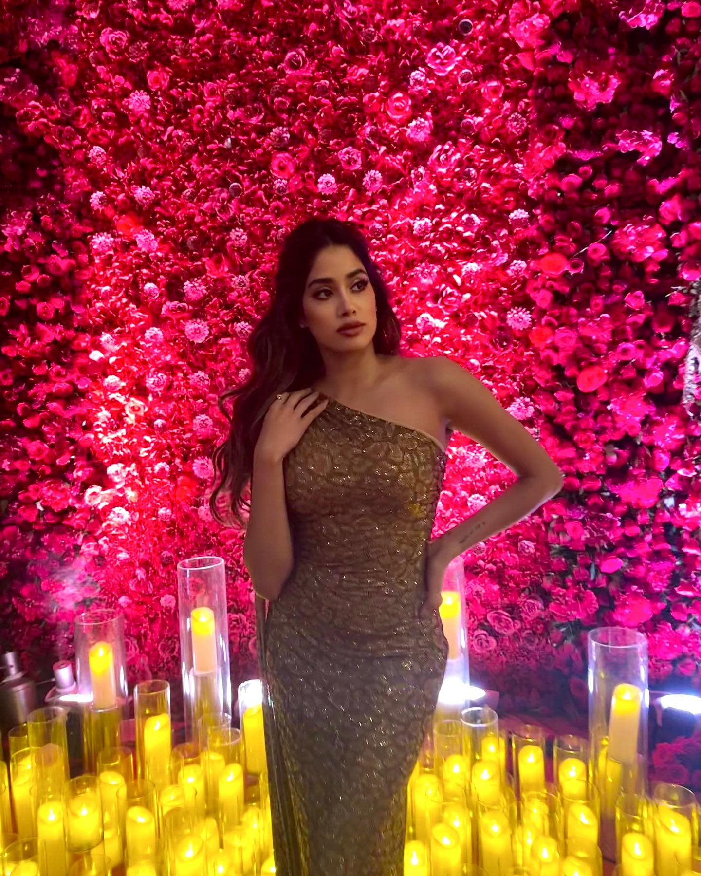 Janhvi Kapoor looked gorgeous in this gold-printed shimmer bodycon dress