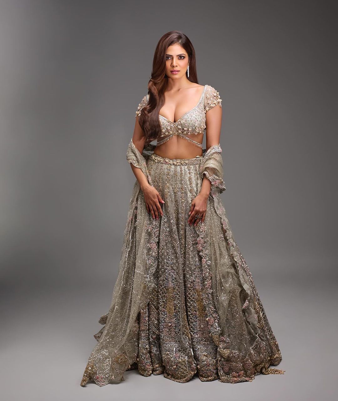 Netizens compare Malavika mohanan with kim kardashian after she wears low neck lehenga