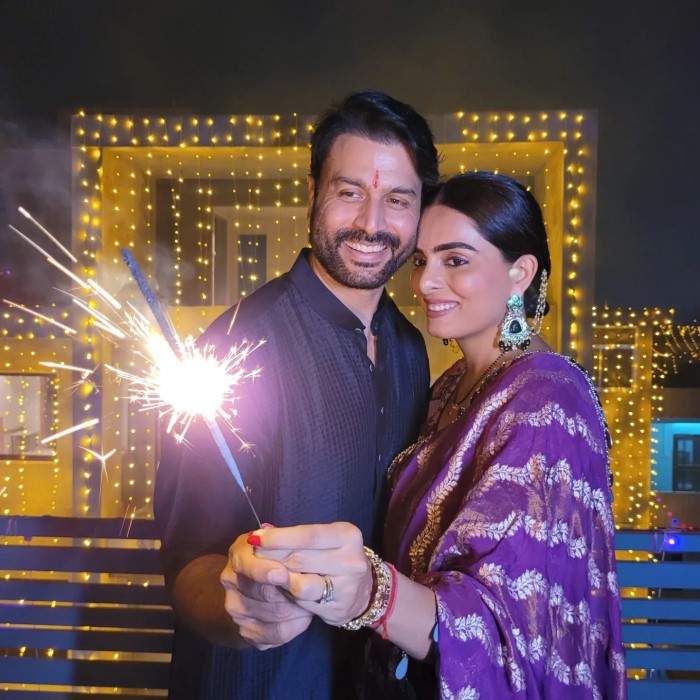 In the announcement, Ruhi is seen in a pink monokini, proudly revealing her baby bump as Shivendraa kisses it, capturing their excitement and love.