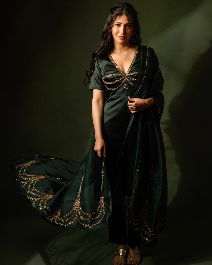 The photoshoot captures Shruti's glamorous appeal, with each image highlighting her ability to blend contemporary style with classic beauty, making a strong fashion statement.