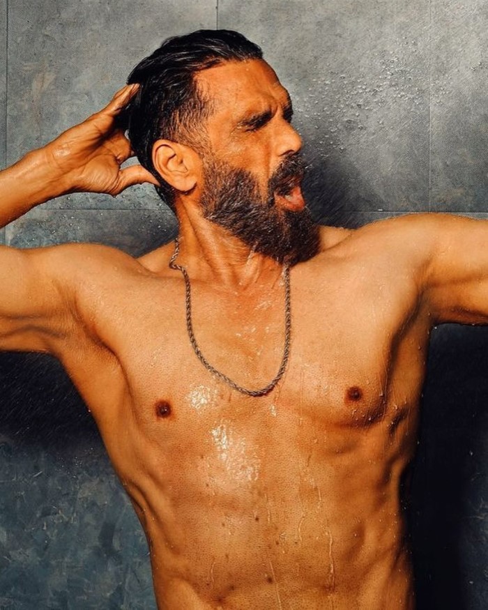 He promotes a balanced diet and healthy habits, showcasing the importance of holistic wellness alongside rigorous exercise.