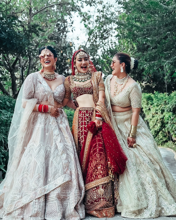 Surbhi Jyoti's elegance and grace are beautifully captured in candid moments, showcasing her radiant smile and the intricate details of her bridal attire.