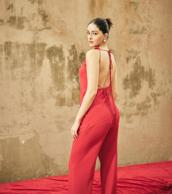 Ananya's accessory choices were on point, featuring a delicate rose choker that added a touch of romance to her outfit.