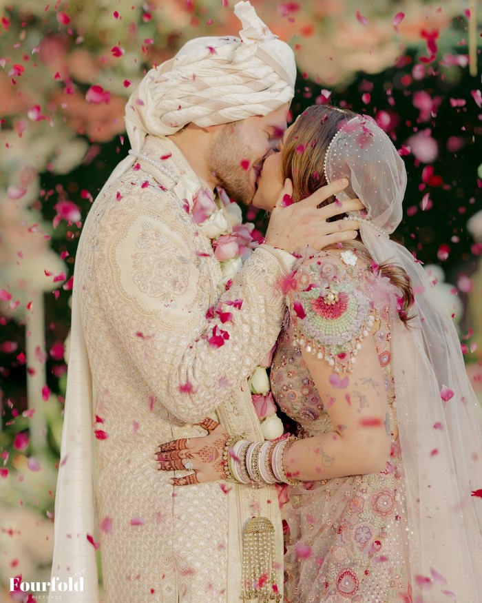 Aaliyah Kashyap looked breathtaking in her blush pink lehenga, adorned with intricate embellishments, as she shared her wedding photos on social media.