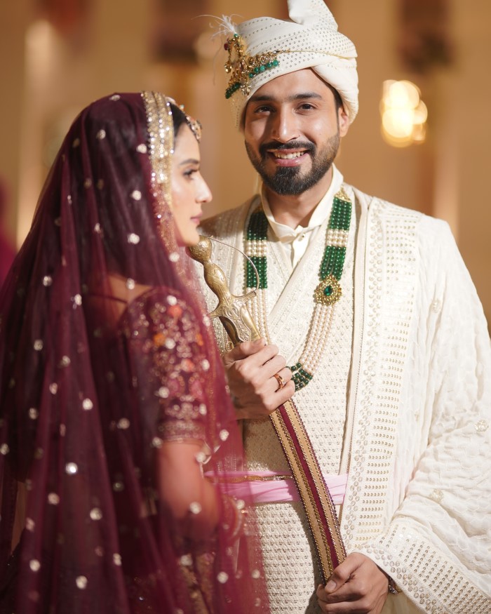 They opted for an intimate engagement ceremony the evening before their wedding, cherishing the special moment in a private, close-knit setting.