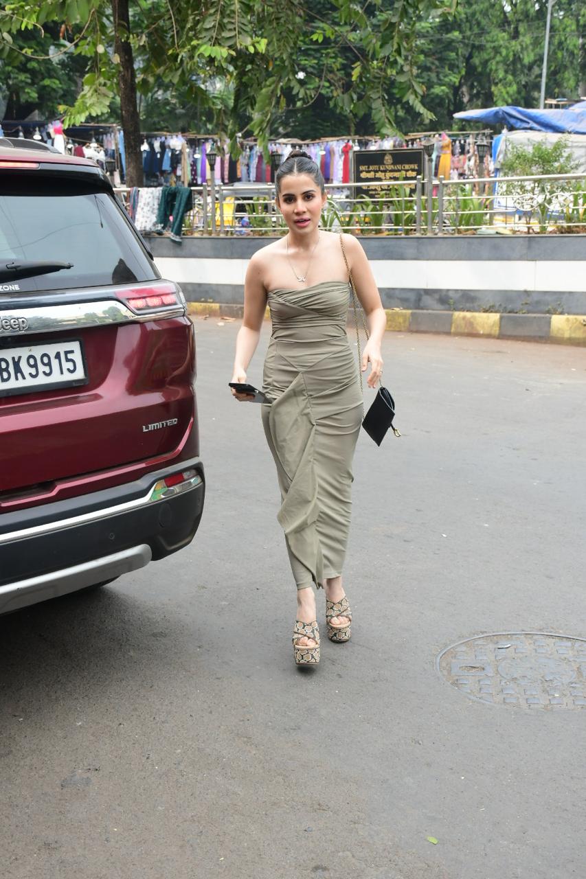 Urfi Javed opted for a strapless olive-green bodycon dress spotted At Bandra.