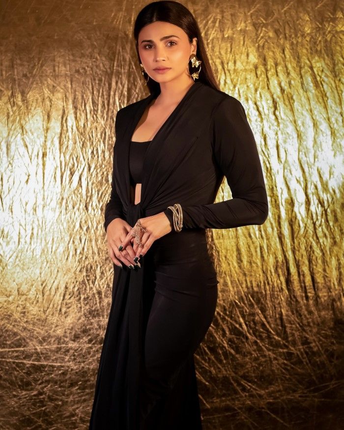 Daisy Shah looked absolutely stunning in her recent photoshoot, donning a chic all-black outfit that accentuated her elegance and style.