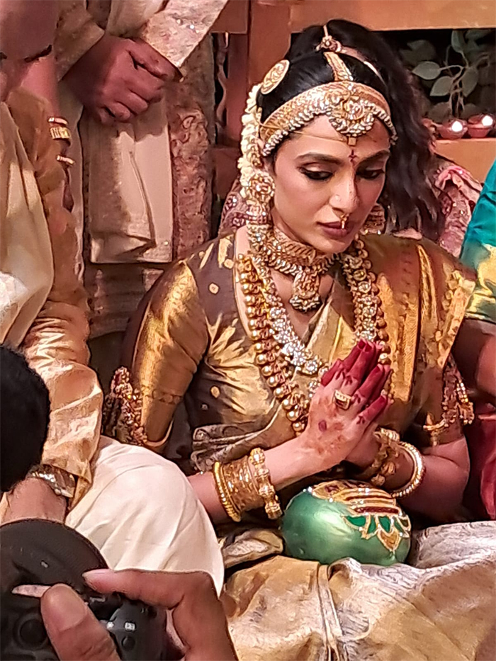 Sobhita Dhulipala is seen wearing a stunning Kanjivaram silk saree adorned with real gold zari, reflecting her cultural roots