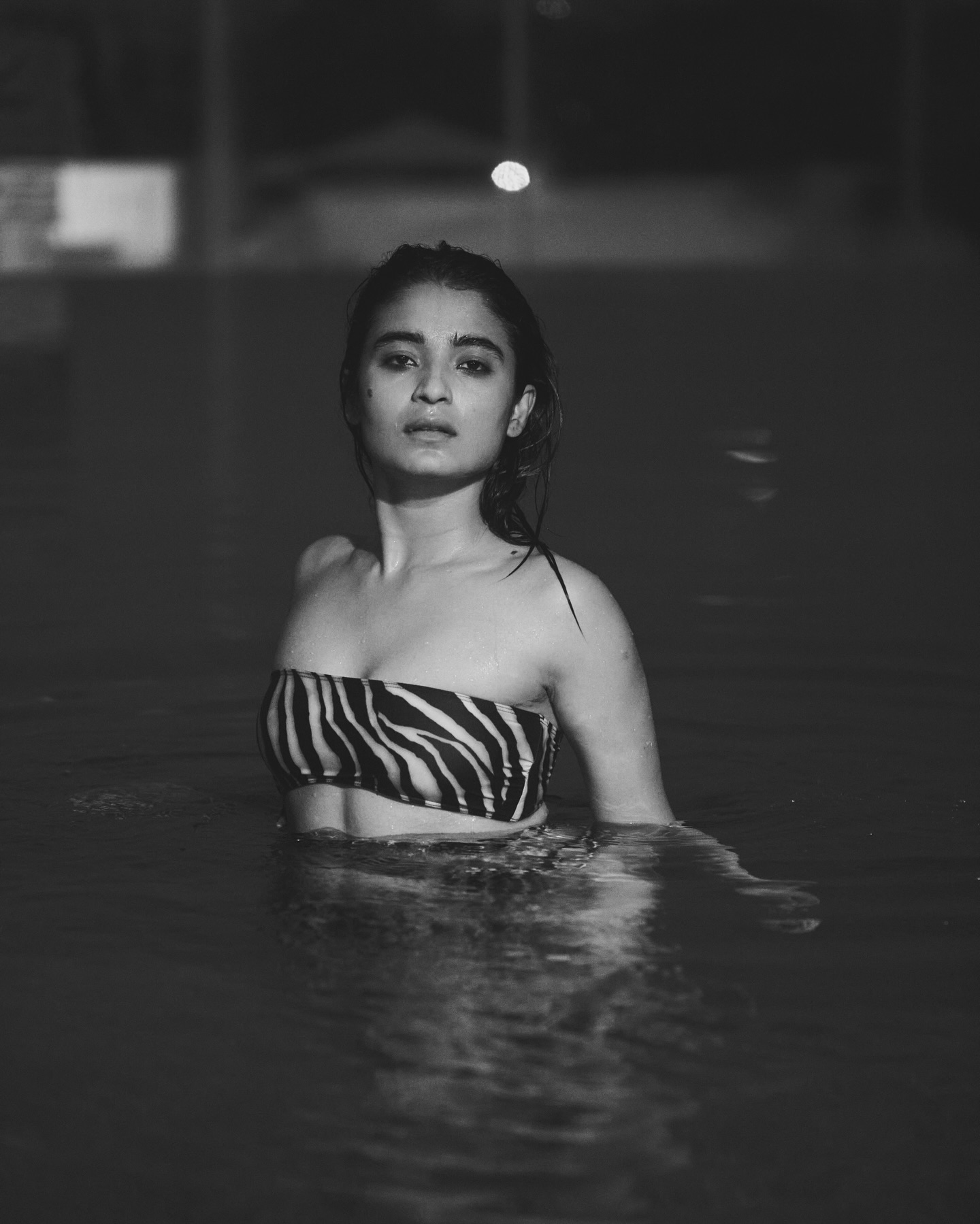 Chaitra J Achar’s bold swimsuit photoshoot gains viral attention.