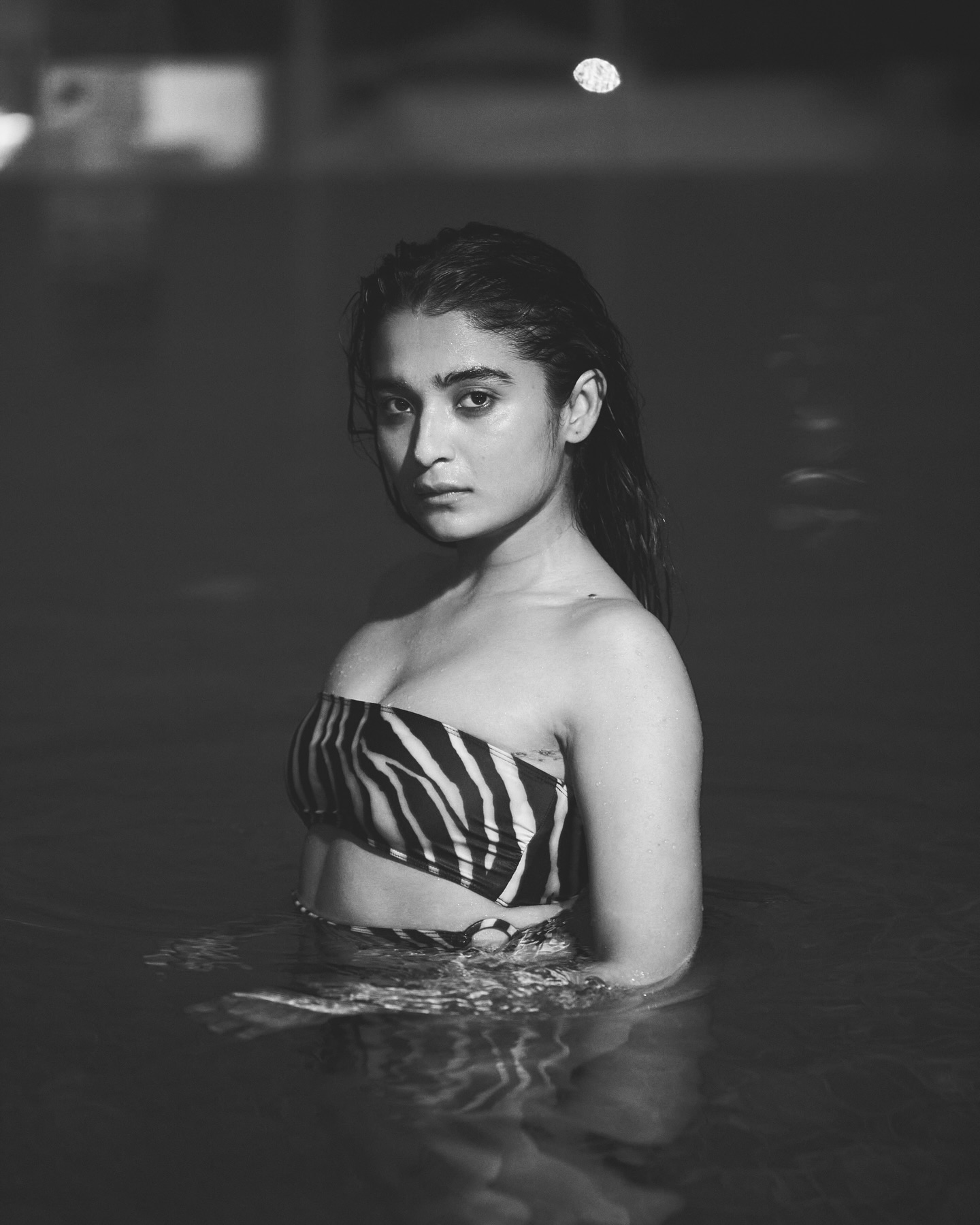 Chaitra J Achar’s bold swimsuit photoshoot gains viral attention.