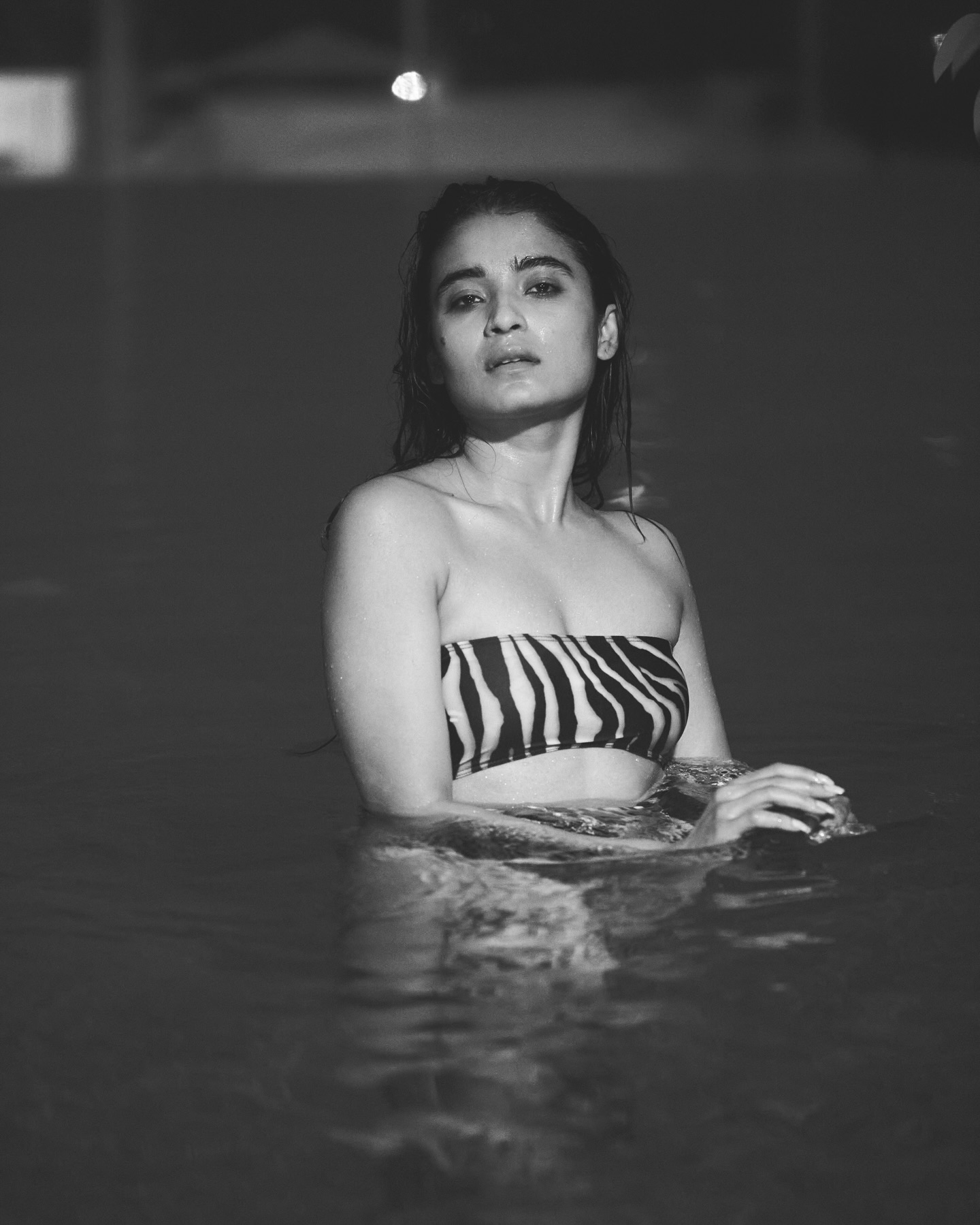 Chaitra J Achar’s bold swimsuit photoshoot gains viral attention.