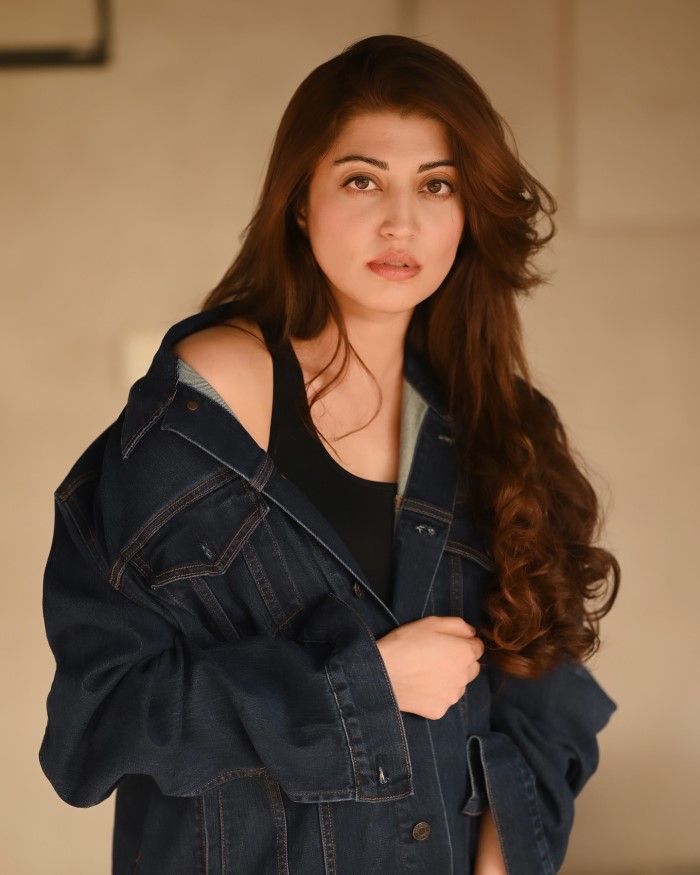 The actress combines a casual denim-on-denim outfit with a fashionable twist, pairing a denim jacket and jeans for a coordinated look.