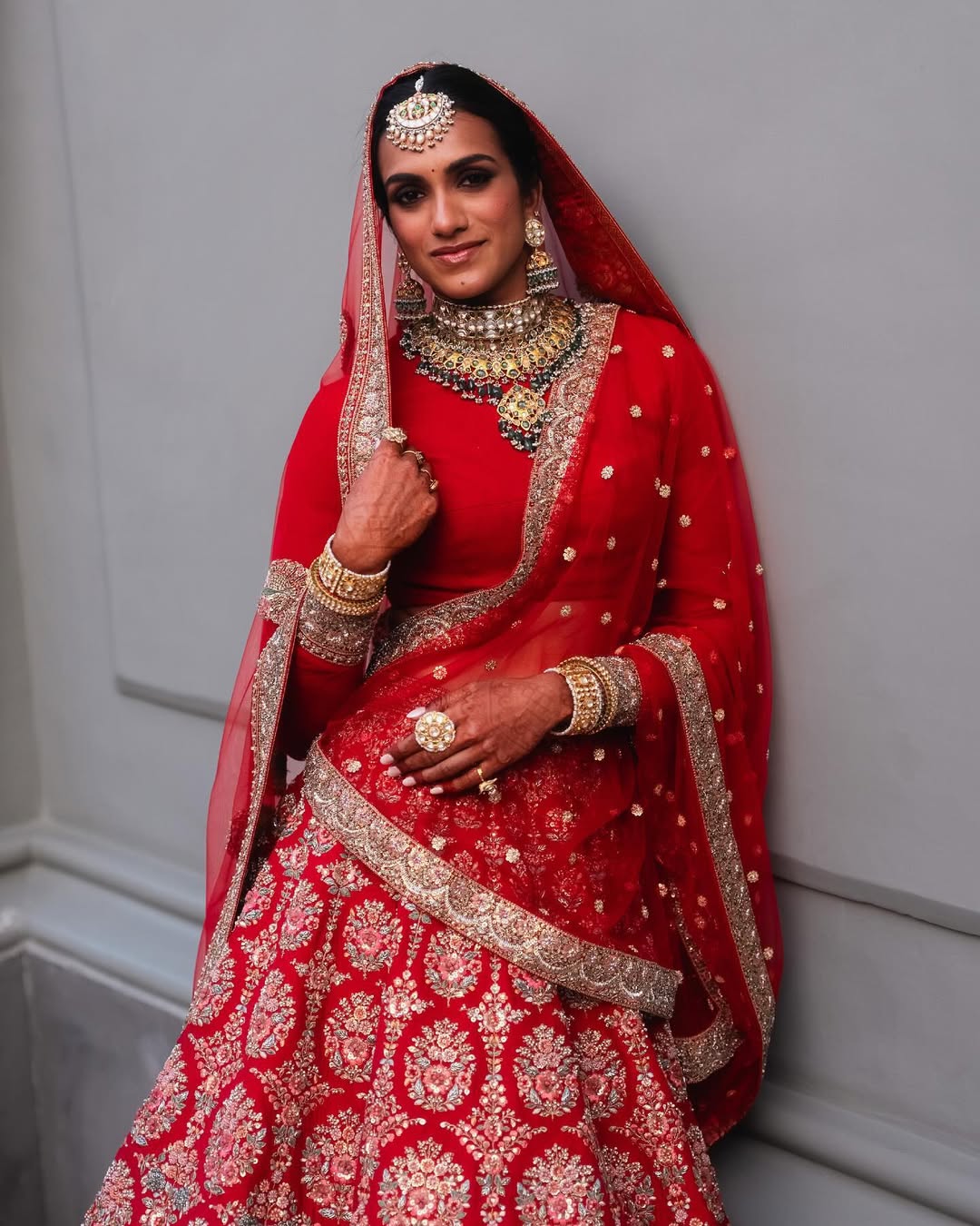 PV Sindhu's Luxurious Red Sabyasachi Bridal Lehenga: A Dreamy Wedding Look