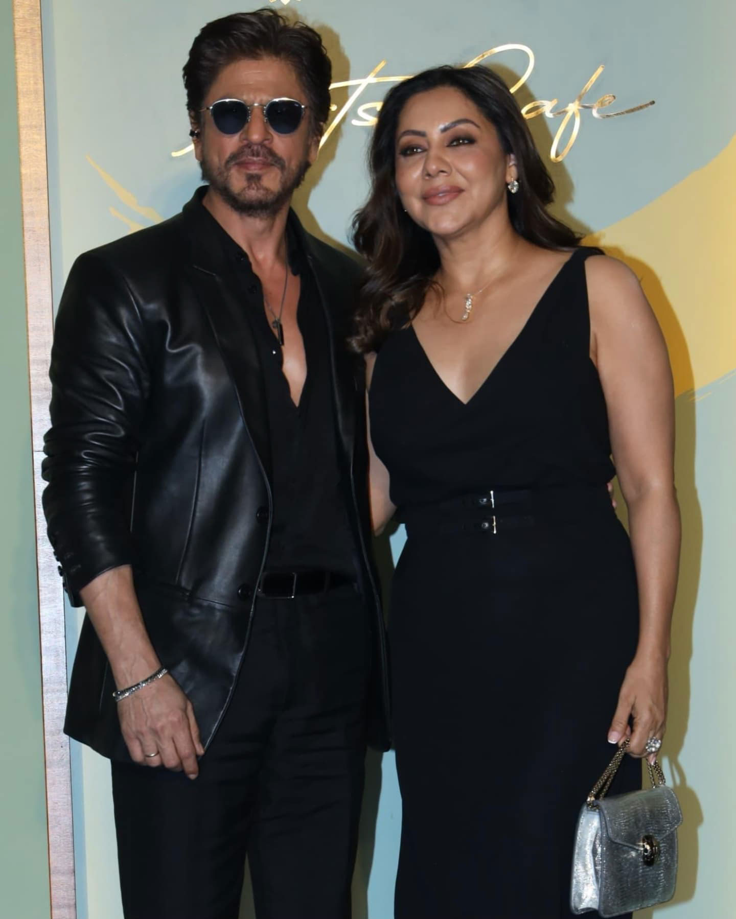 Shah Rukh Khan and Gauri Khan made a stylish appearance at the NMACC Arts Cafe launch, both dressed in black.