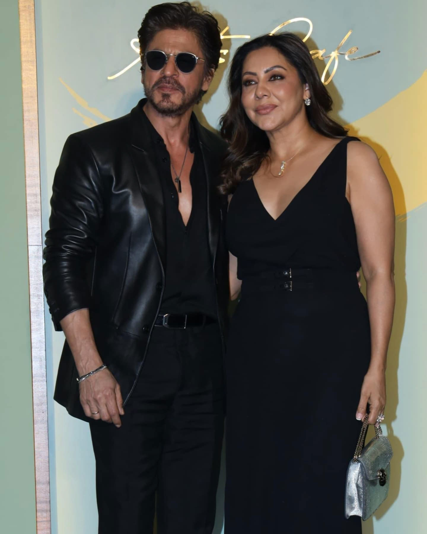 Shah Rukh Khan and Gauri Khan made a stylish appearance at the NMACC Arts Cafe launch, both dressed in black.