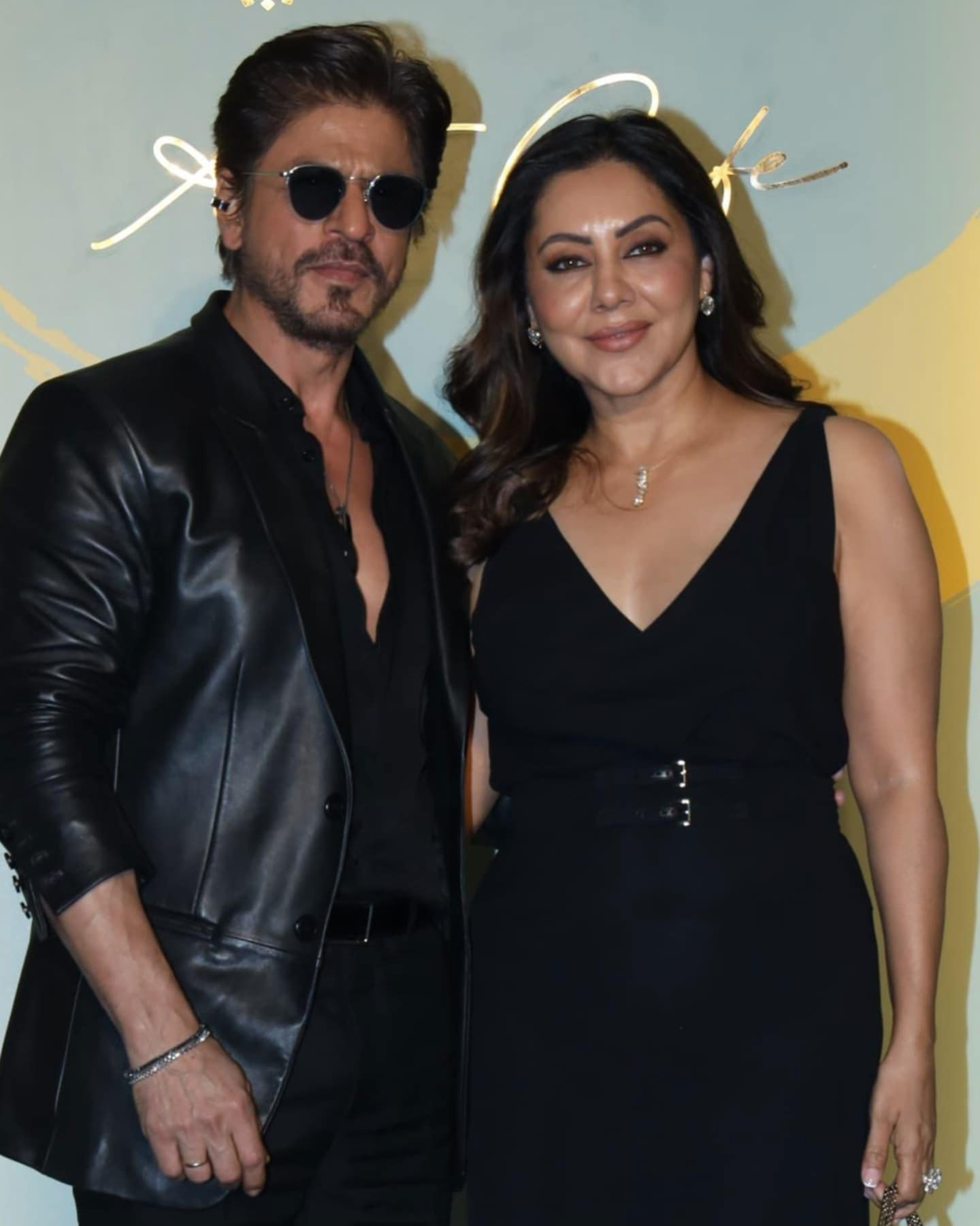 Shah Rukh Khan and Gauri Khan made a stylish appearance at the NMACC Arts Cafe launch, both dressed in black.