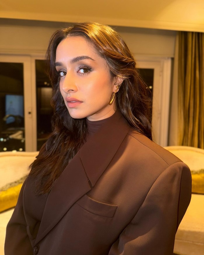 By keeping accessories minimal, Shraddha allows the outfit's chic elements to stand out, highlighting her natural beauty.