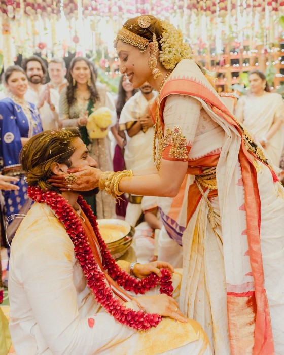 The photos capture intimate moments, including Sobhita lovingly holding Naga Chaitanya’s face and the couple exchanging flower garlands during the jaimala ceremony.