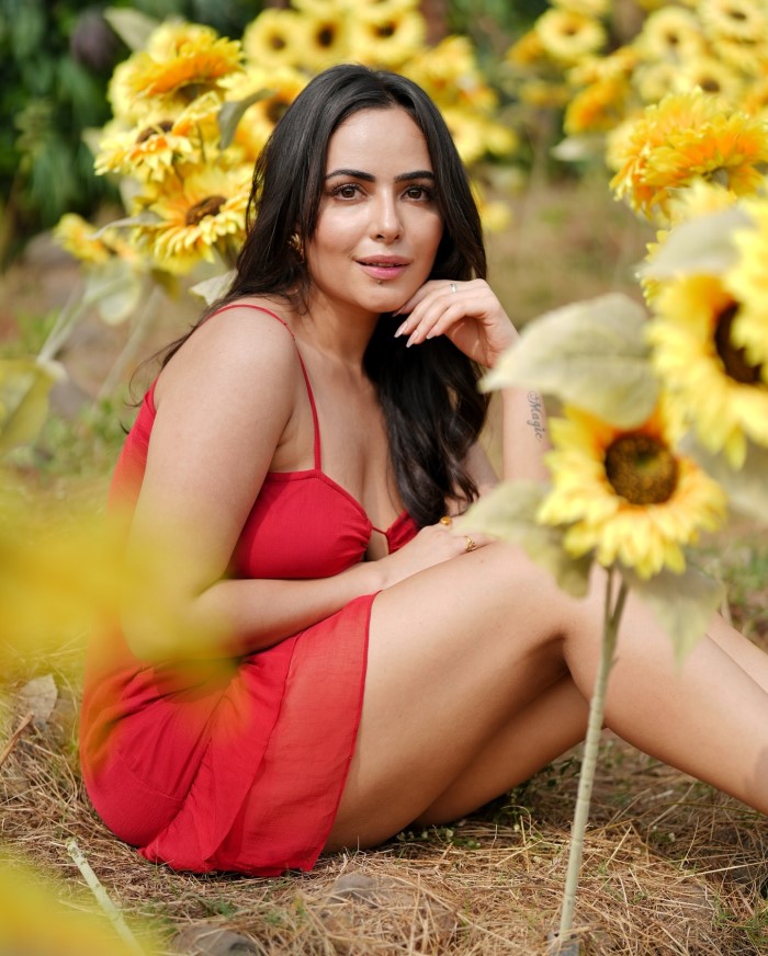 Paired with simple golden earrings, the styling keeps the focus on the dress while maintaining a classy appearance.
