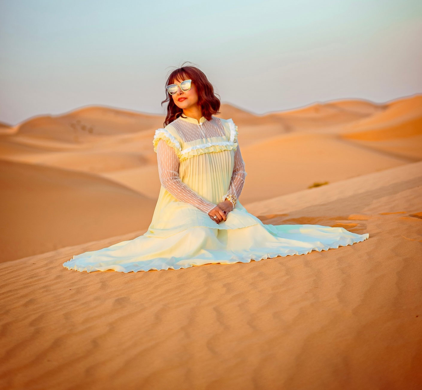 Hina Khan dazzles in an off-white gown that harmonizes with the desert backdrop