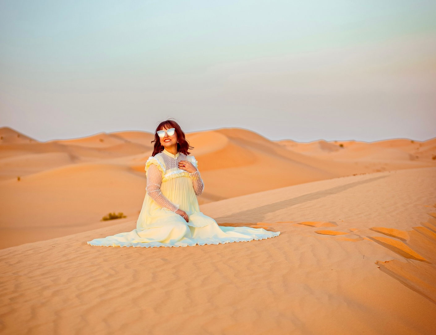Hina Khan dazzles in an off-white gown that harmonizes with the desert backdrop